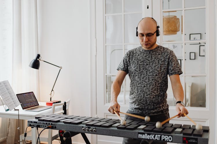 Man Playing Black Xylophone