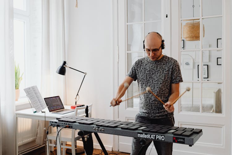 Man Playing Black Xylophone
