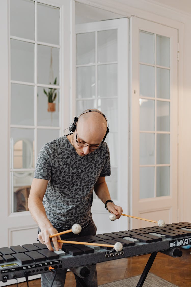 Man Playing Black Xylophone