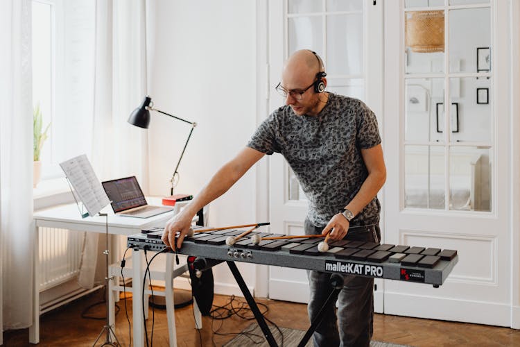 Man Playing Black Xylophone