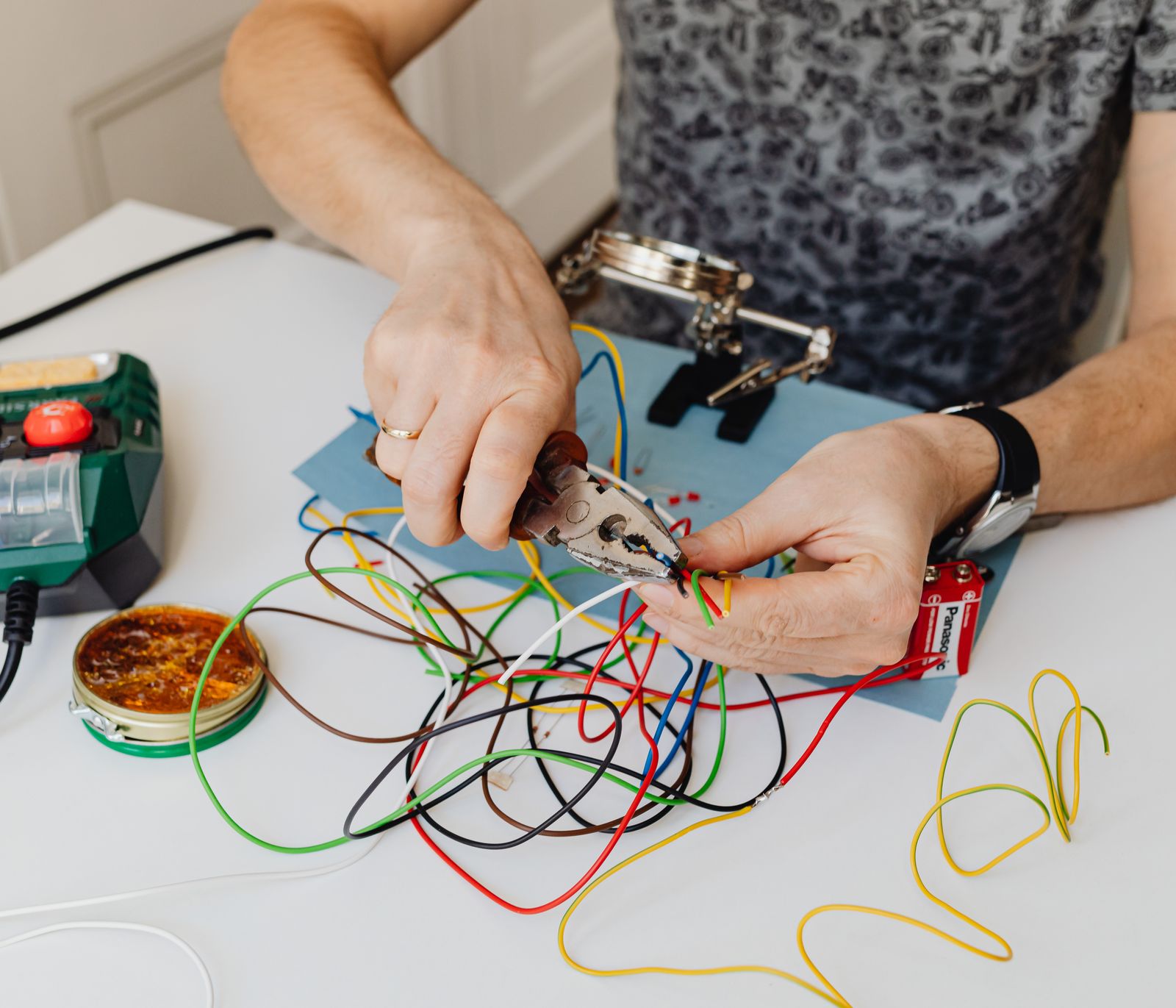 Electrical wiring work during a commercial maintenance visit