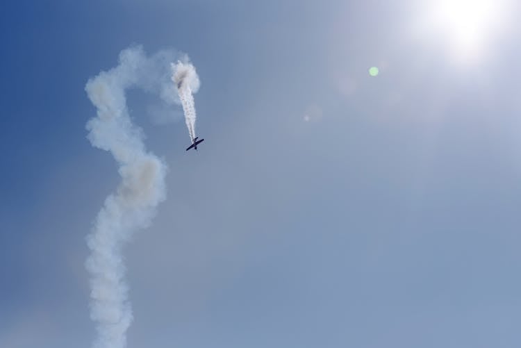 Airplane Performing Air Tattoo In Sunny Sky