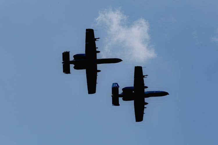 Bomber Combat Aircraft Flying In Blue Sky