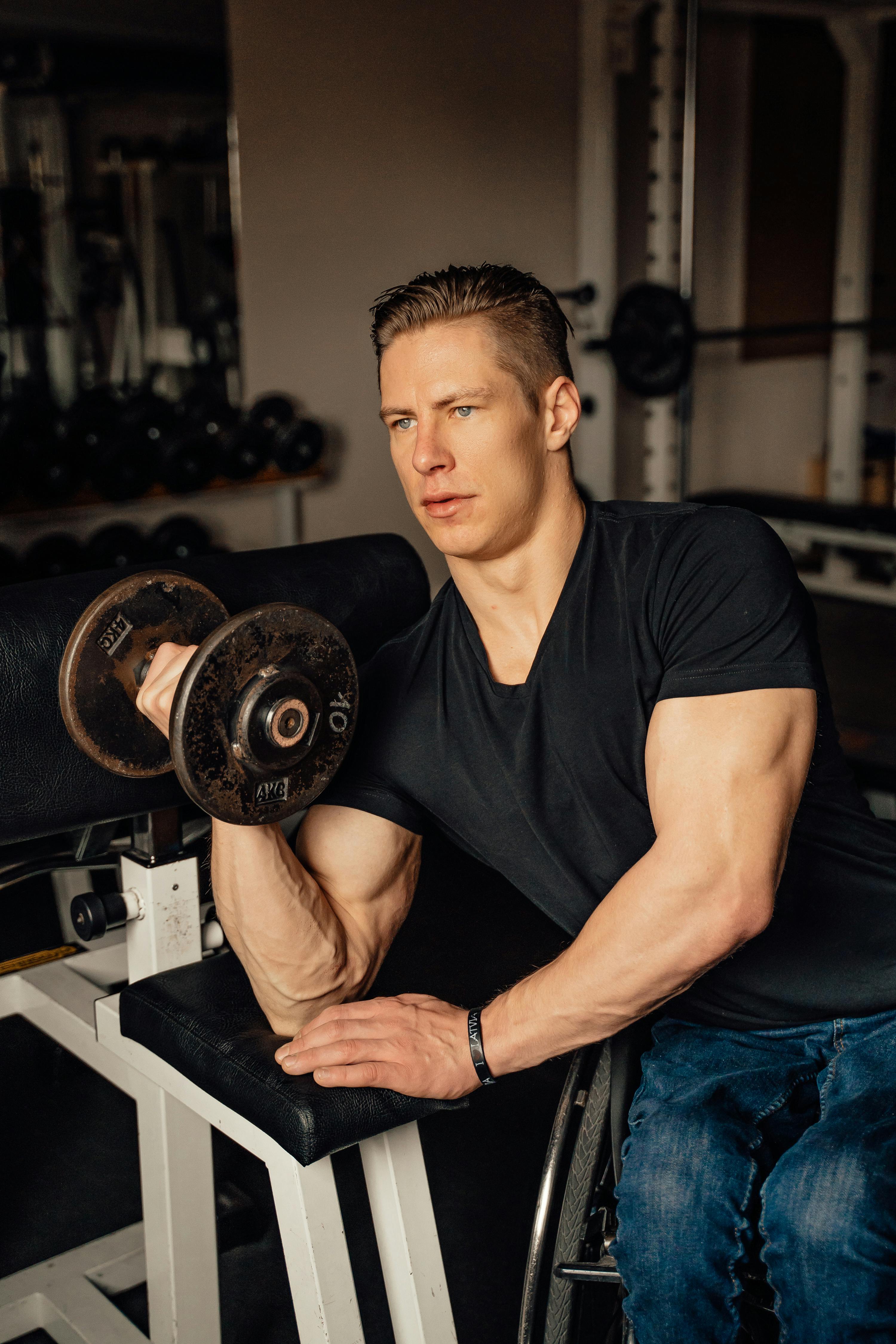 Man Holding Black Dumbbell · Free Stock Photo