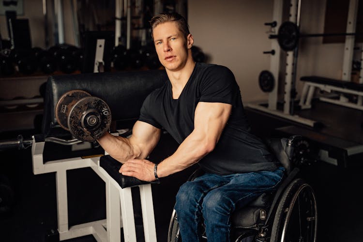 A Man Doing A Dumbbell Bicep Curl