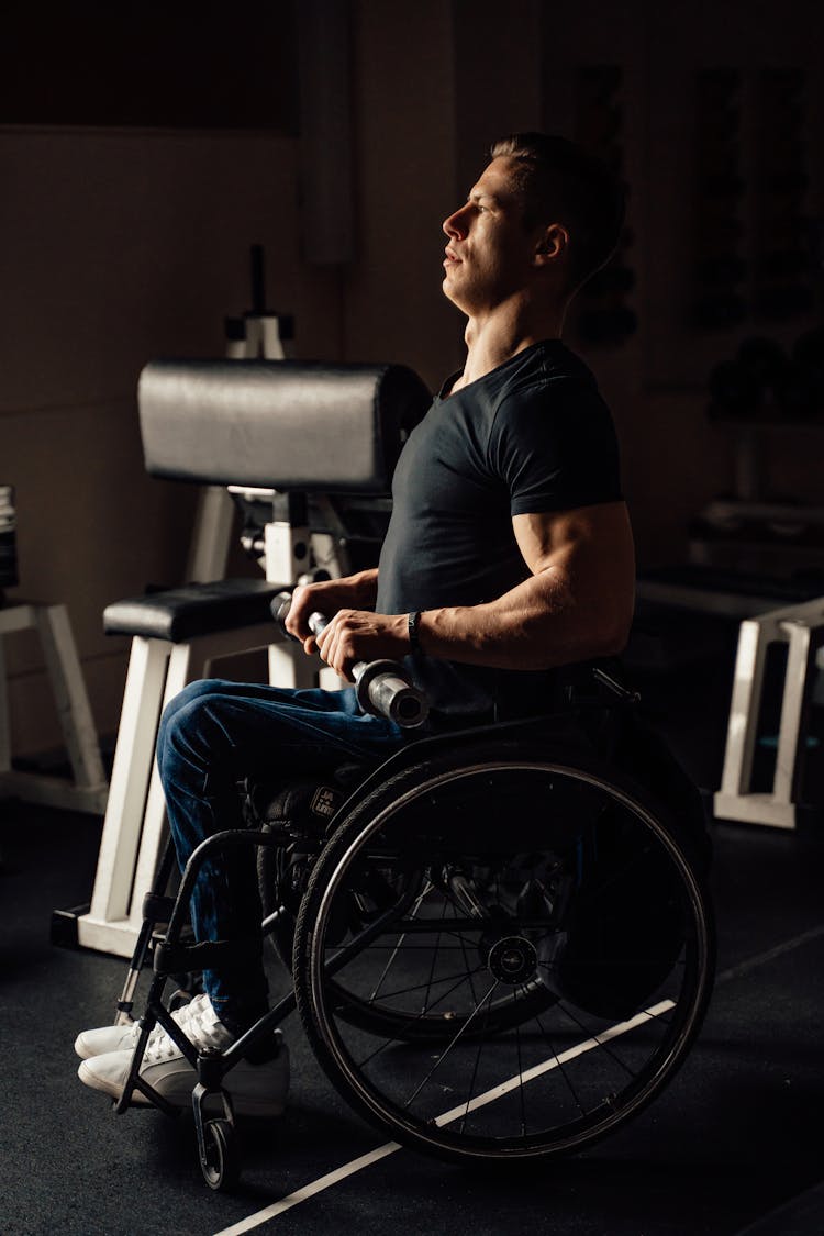 Man In A Wheelchair Exercising