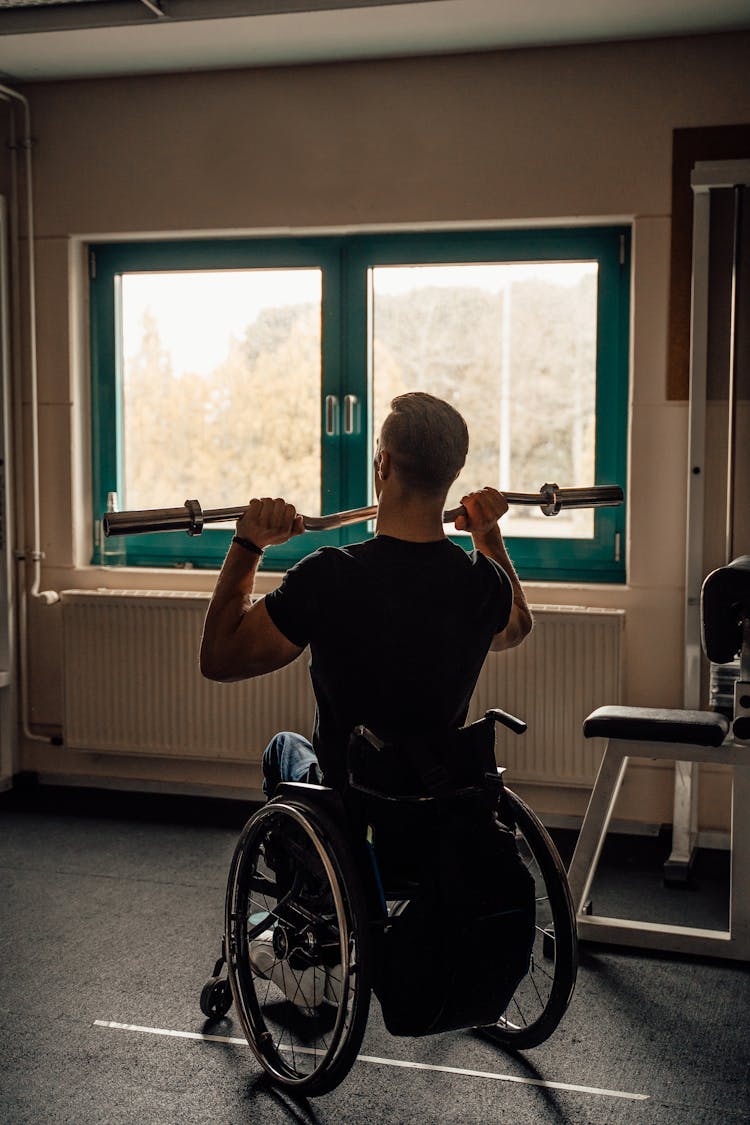 Man Wearing A Black Shirt Exercising