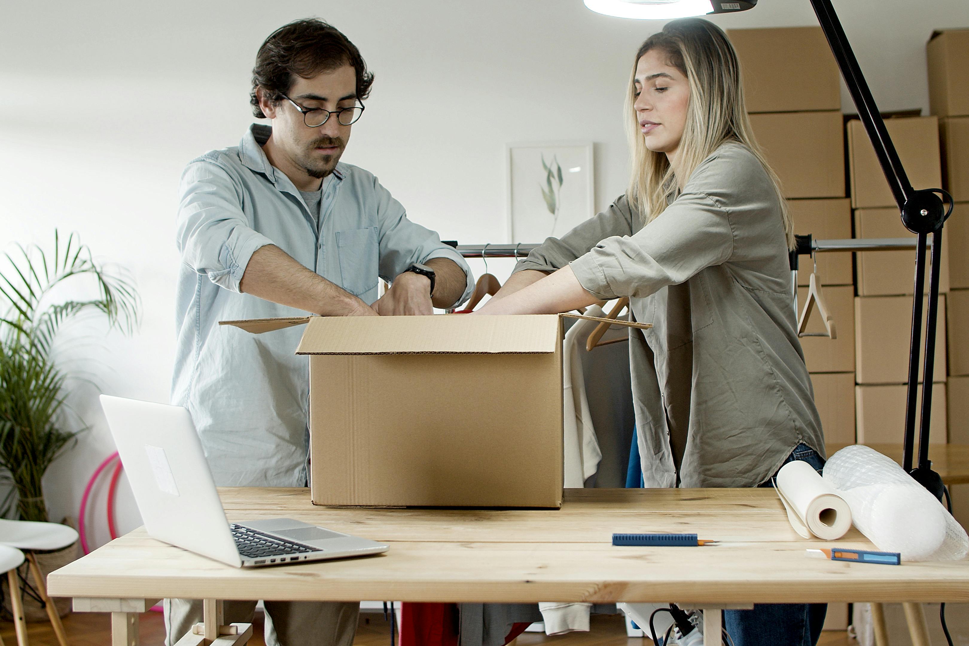 couple packing products together