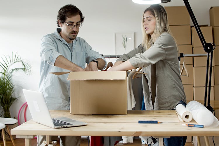 Couple Packing Products Together