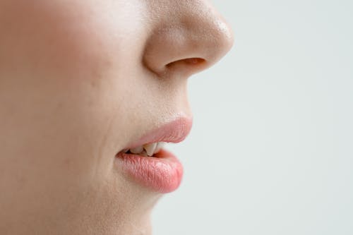 Side View of Woman's Face in Close Up Photography