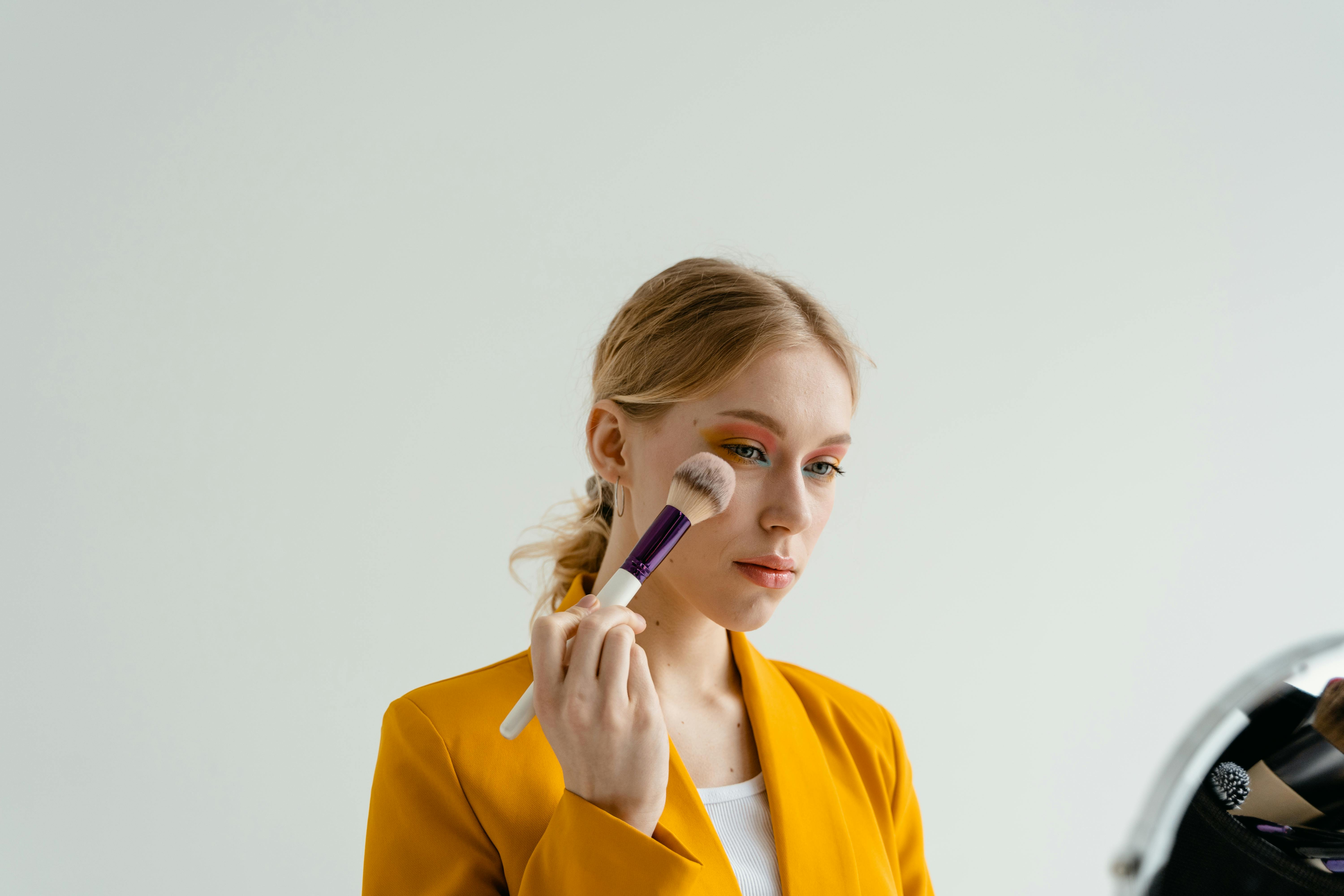 Free A Woman Applying Makeup Stock Photo