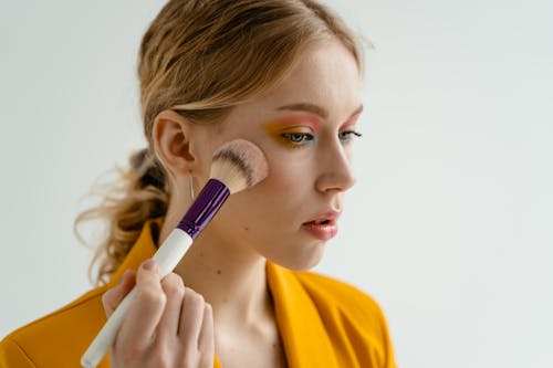 A Woman Applying Makeup