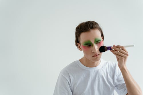 A Man Applying Makeup