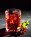 Clear Drinking Glass With Red Liquid and Ice