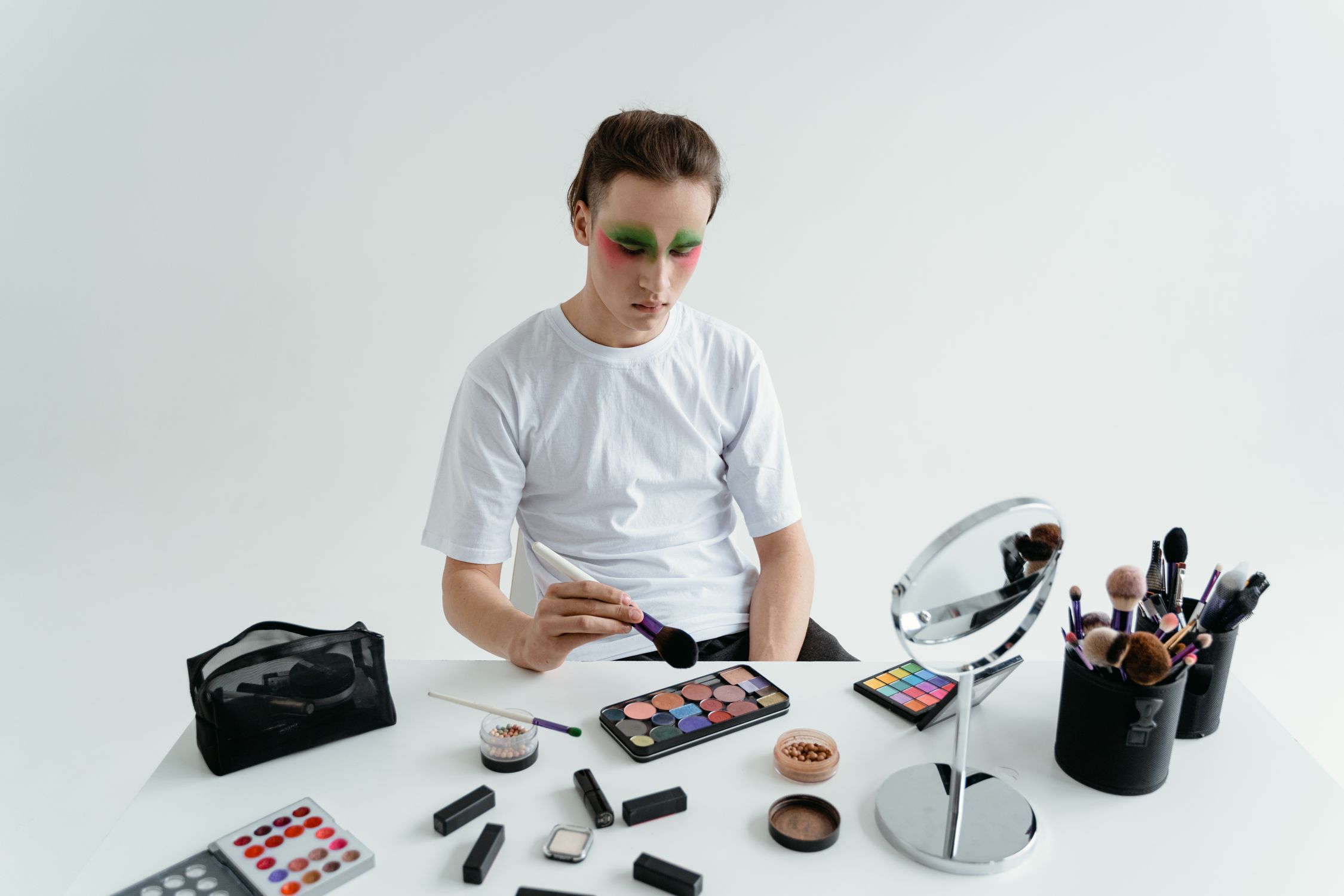 Man Using Cosmetics A Man Applying Makeup · Free Stock Photo