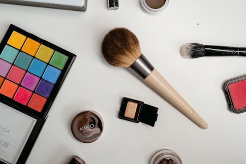 Assorted Beauty Products on White Surface