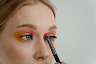 Woman With Pink Lipstick and Black Mascara