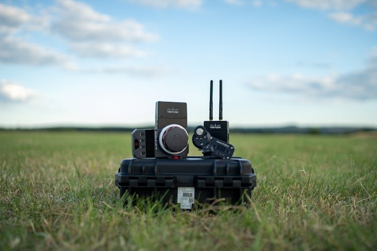 Black Camera On Black Wooden Table