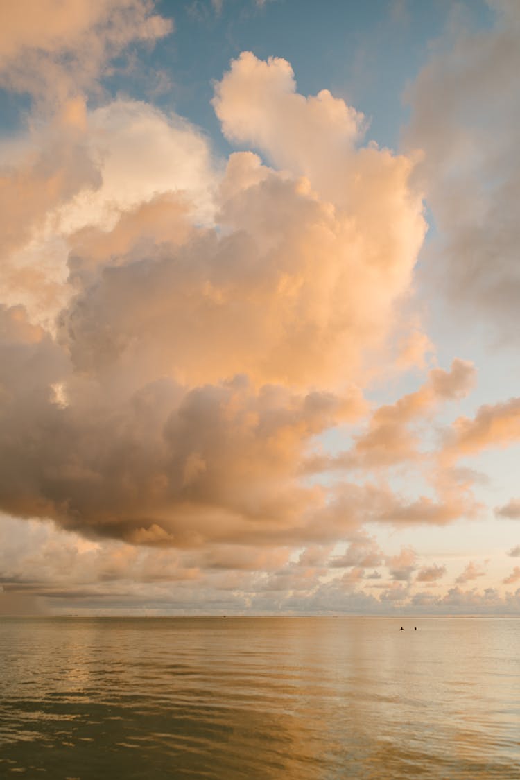 Sunset Sky Over Rippling Sea