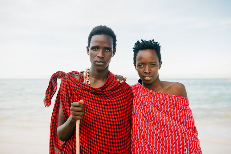 African Father And Son On Seashore