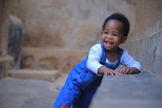 Kid in Blue Jumper