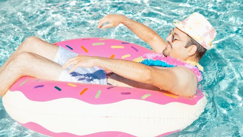 Man on Donut Swim Ring