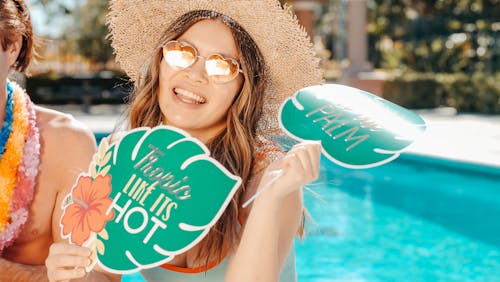 Free Woman Smiling while Wearing a Sun Hat Stock Photo