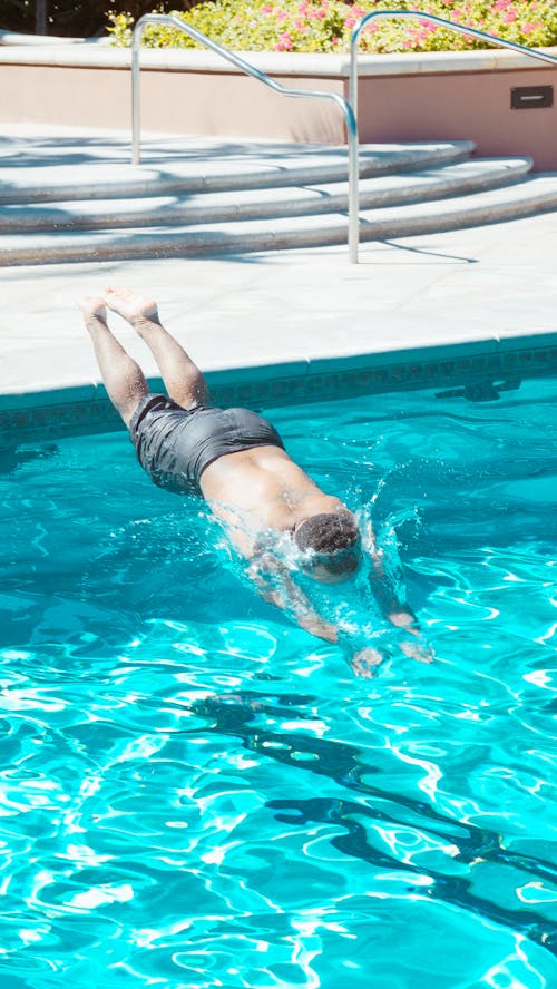 Man Plunging into the Pool