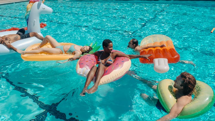 People Swimming In The Pool