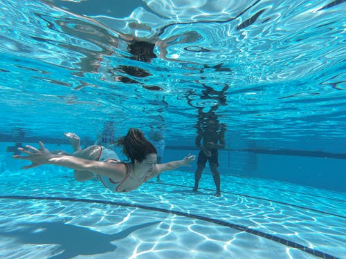 Woman Swimming in the Pool