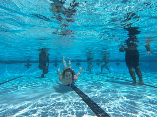 Woman Swimming in the Pool