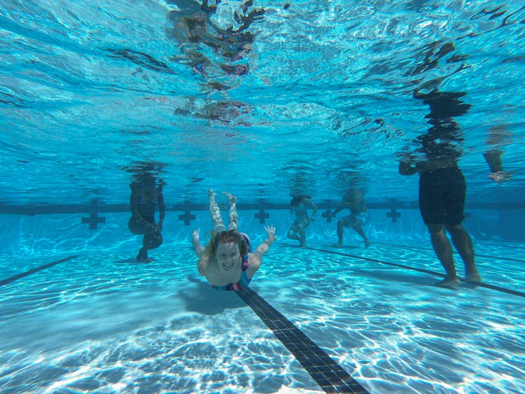 Woman Swimming In The Pool