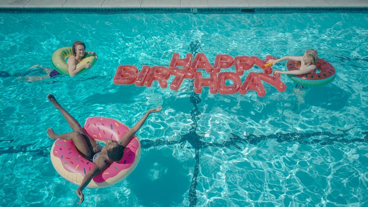 People Swimming In The Pool