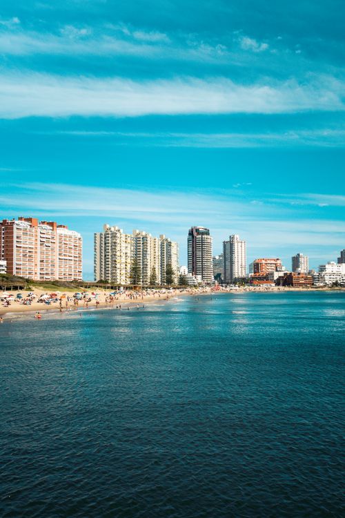 Free Explore the stunning skyline and beach of Punta del Este, Uruguay, on a sunny day with clear blue skies and vibrant cityscape. Stock Photo