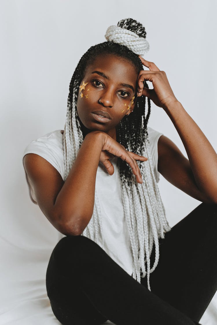 Woman With White Hair Extensions And Stars On Face