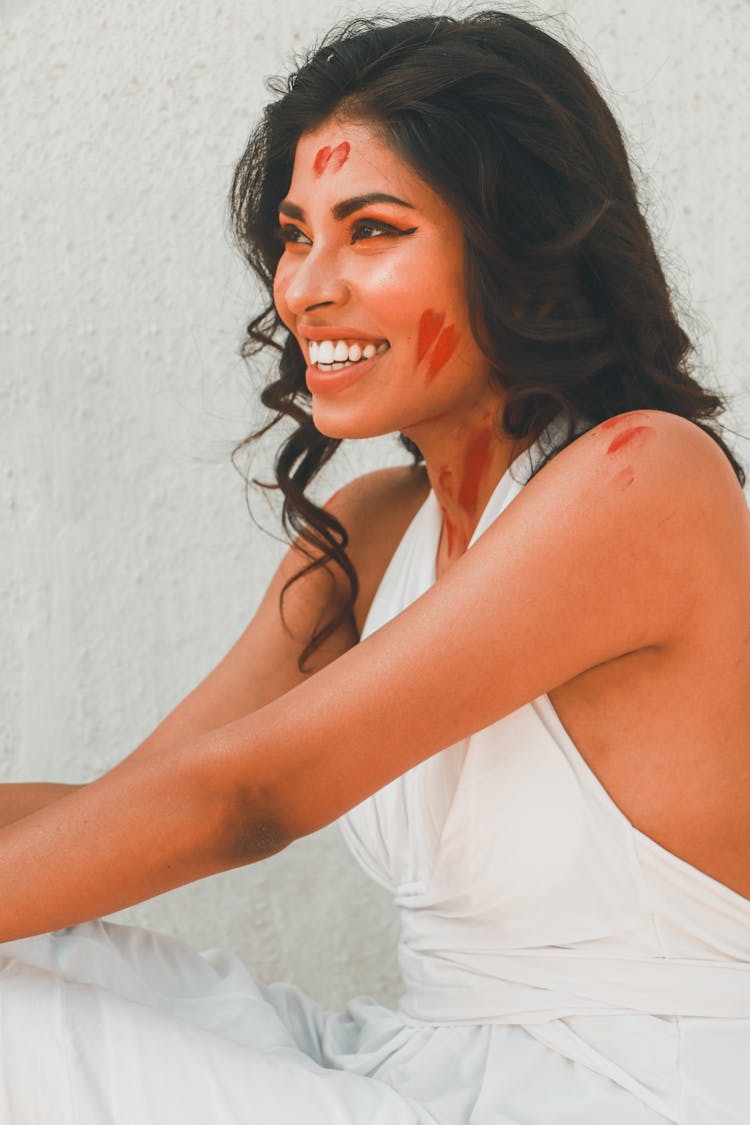 Woman In White Sleeveless Dress Smiling