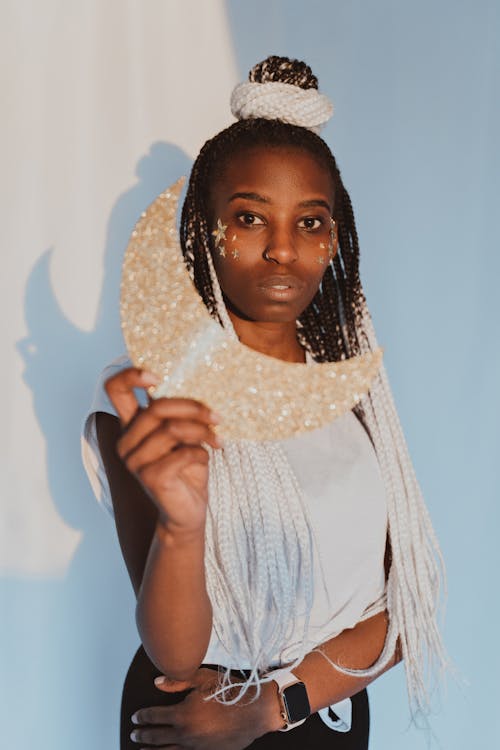 Woman Holding a Moon Cutout