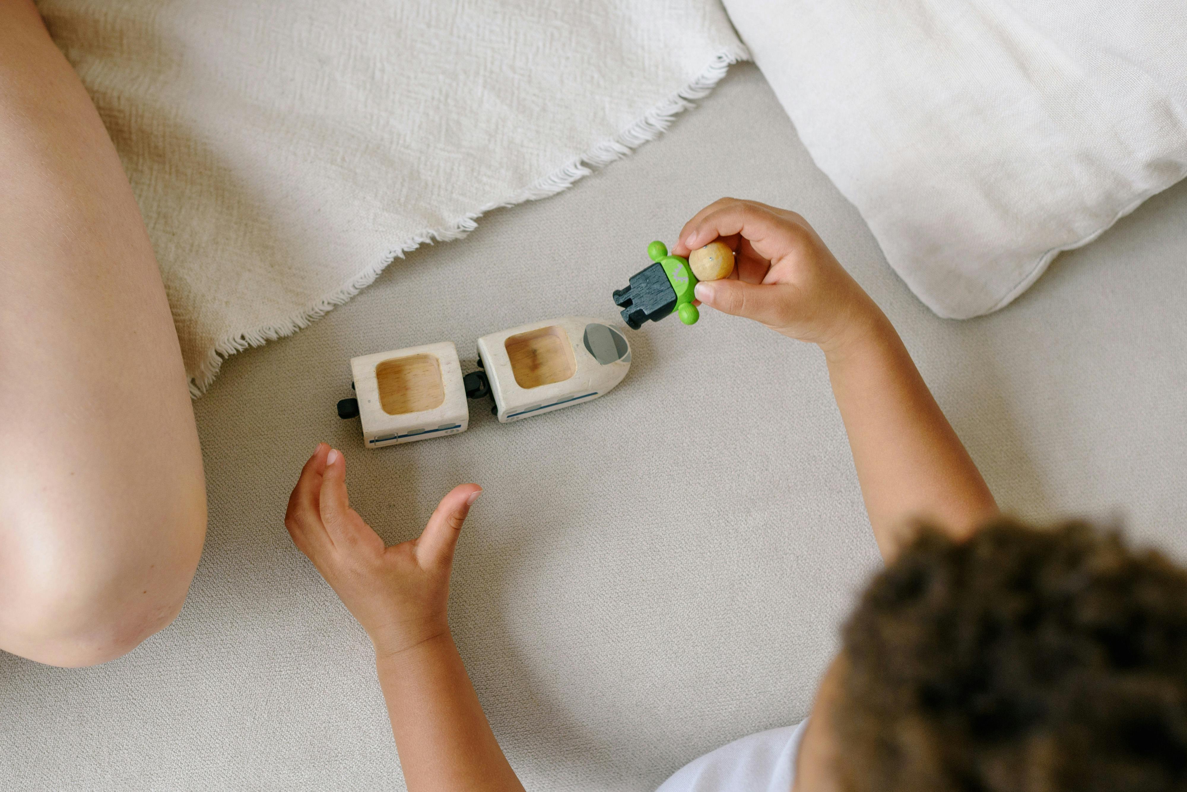 a kid holding a toy