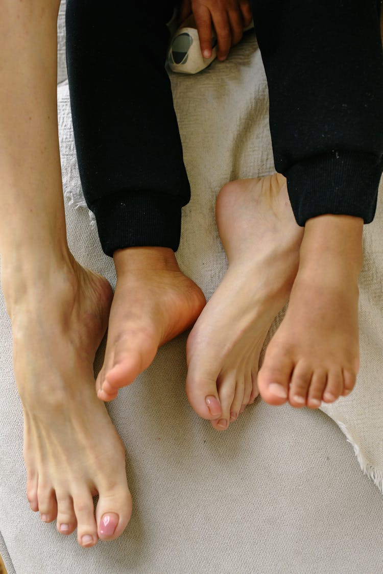 Small And Big Bare Feet

