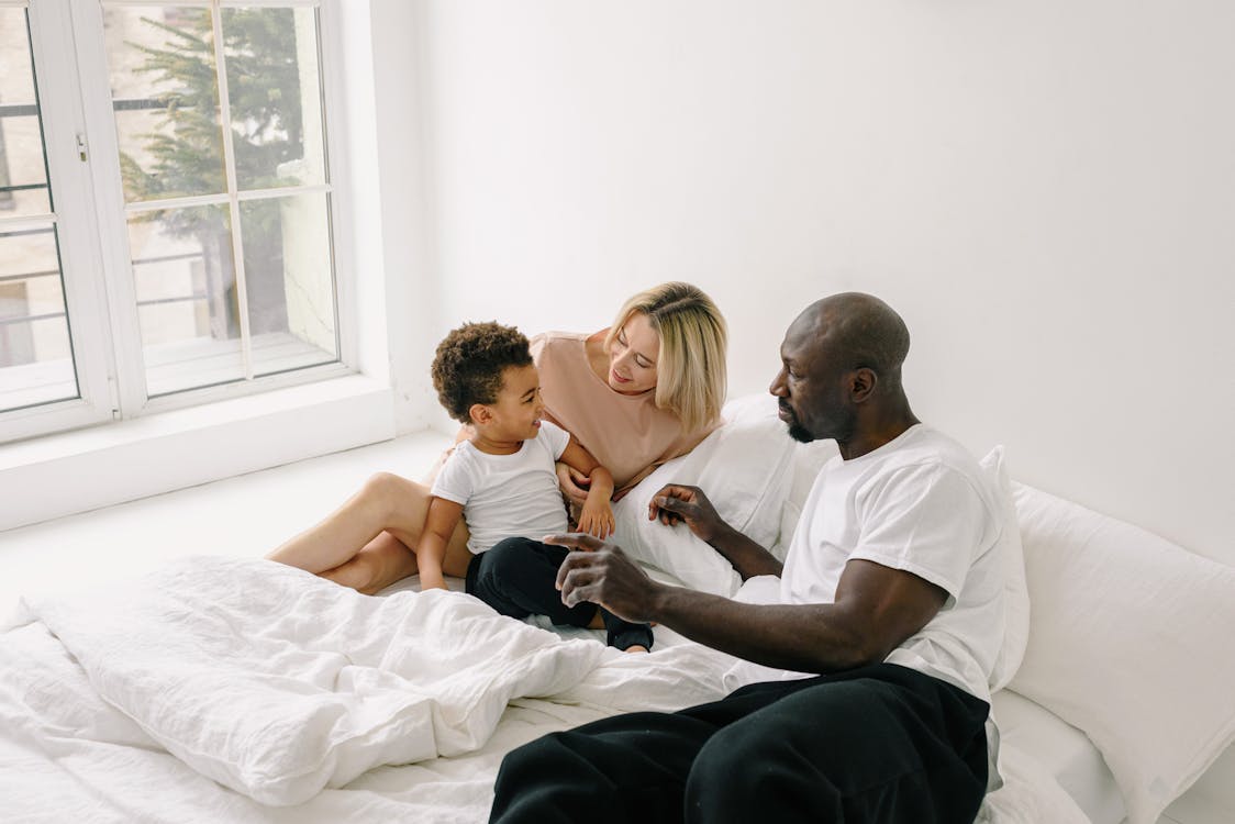 A Family on the Bed Together