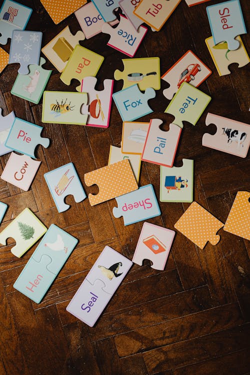 Puzzle Pieces on a Wooden Floor