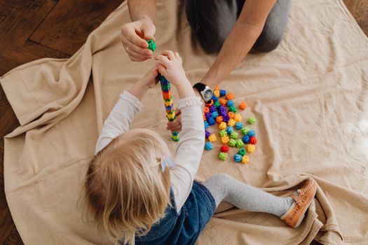 Top View of a Girl Playing Toys