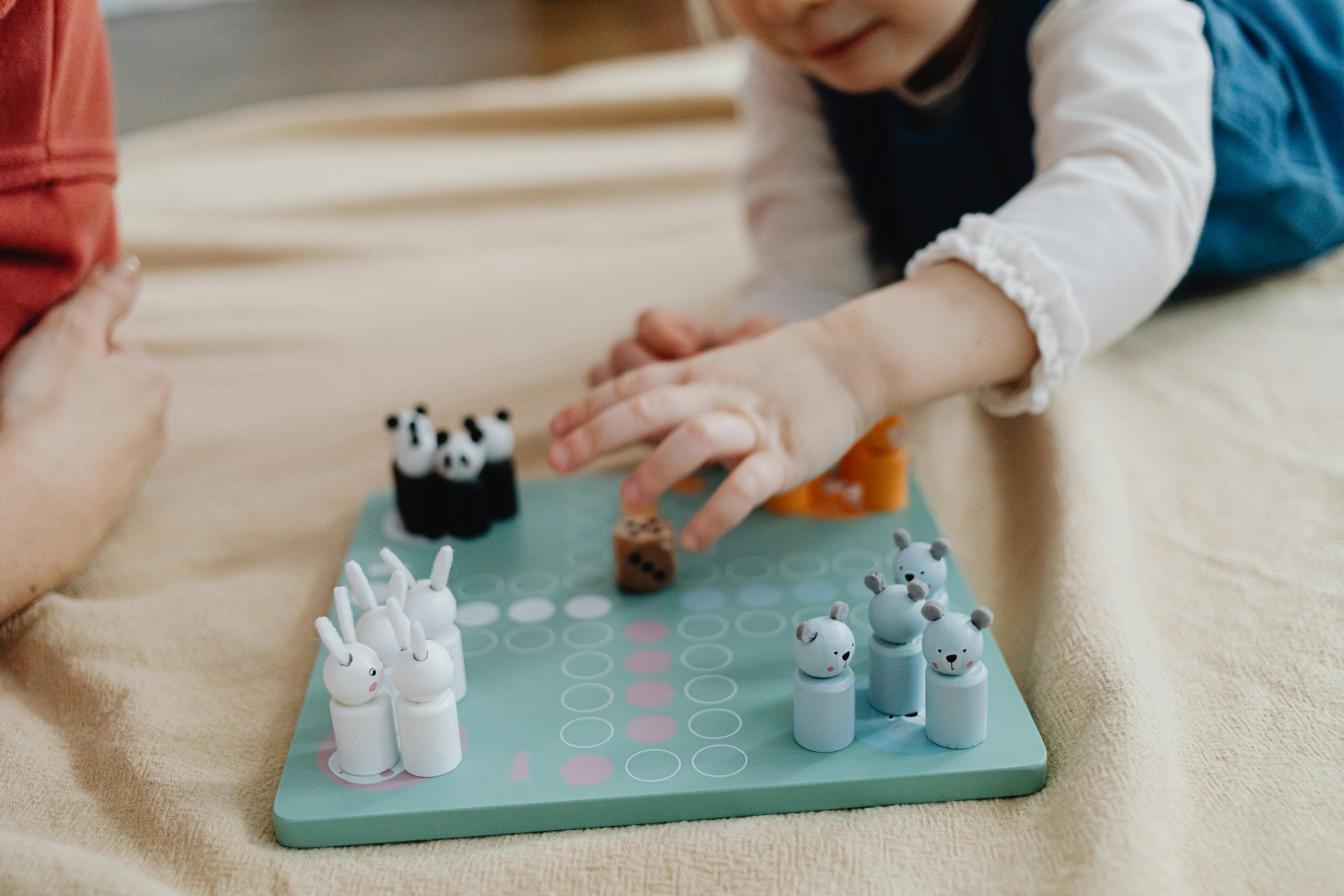 child playing wooden game