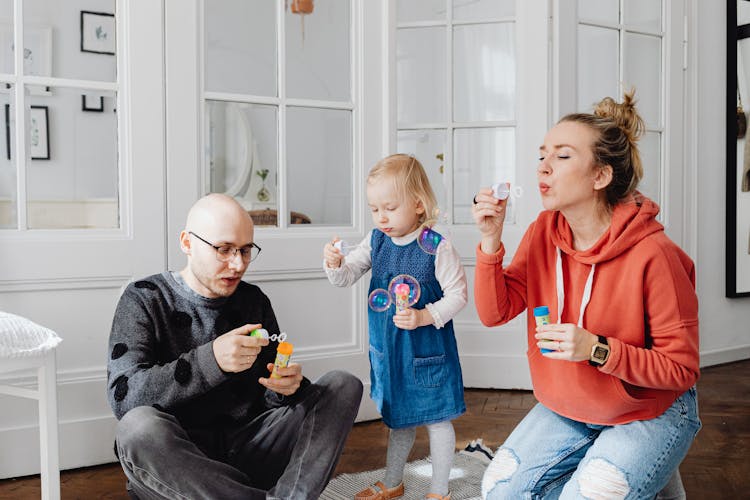 A Family Playing Bubbles Together