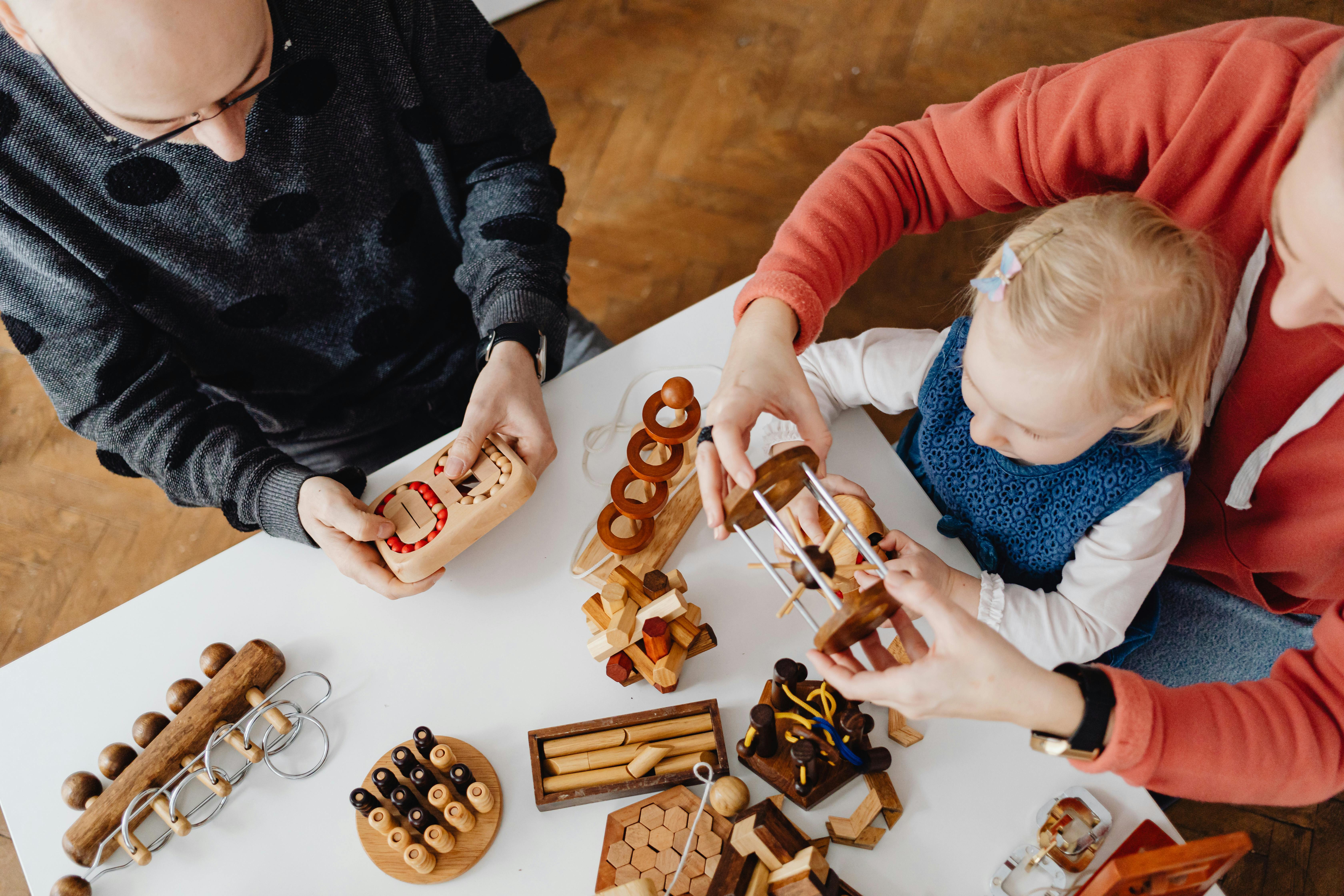 overhead shot of a family solving puzzles