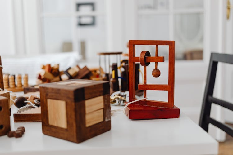 Wooden Puzzles On A White Surface