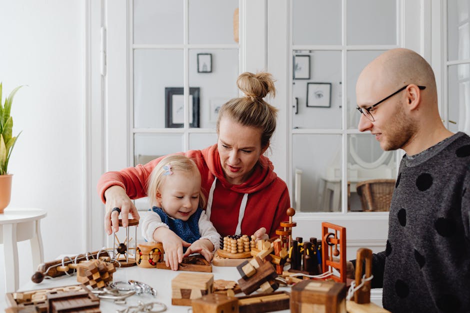 How Puzzle Feeders Ease Separation Stress in Dogs A family enjoying time together playing with educational wooden toys indoors. Warm and candid interaction.