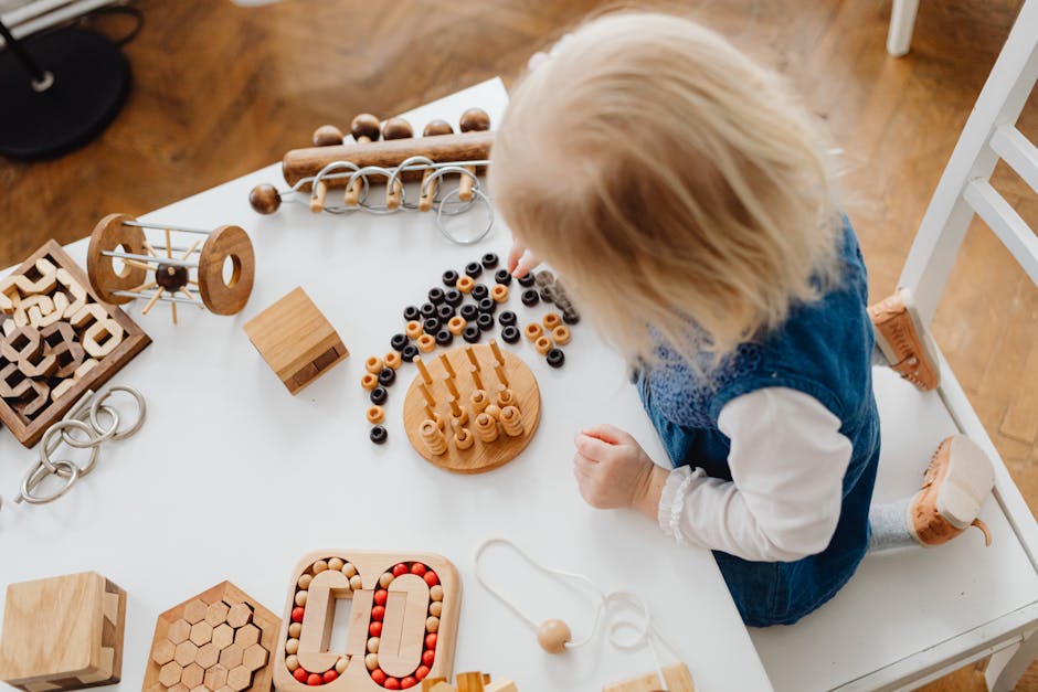 A child engaged in learning with wooden toys at a table, perfect for early education themes.