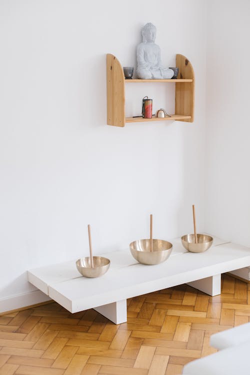 Minimalistic Interior with Buddha Statue and Tibetan Singing Bowls