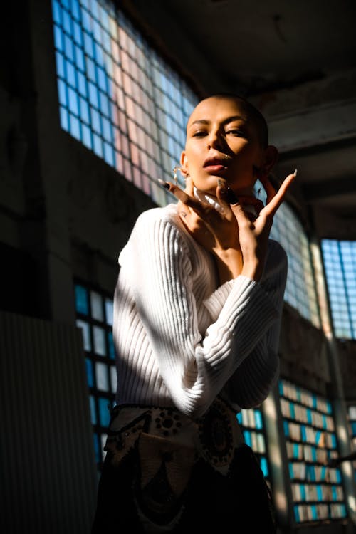 Bald Woman Posing Indoors